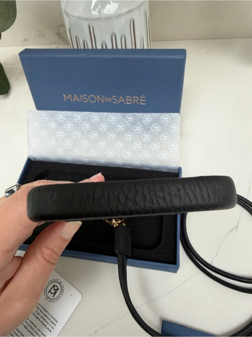 Maison de Sabre Sling Phone Case iPhone 14 Pro in Black Caviar and Gold Hardware